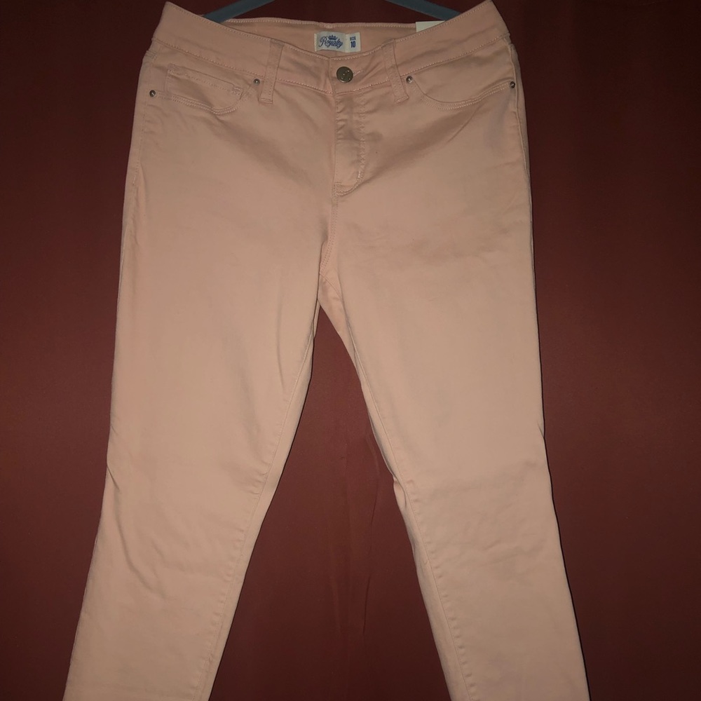 Peach colored stretchy jeans